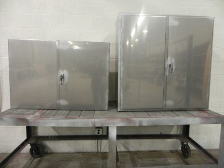 STAINLESS STEEL ENCLOSURES WITH LOCKING HANDLES