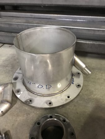 TRANSITION PIECES FOR MATERIAL FLOW