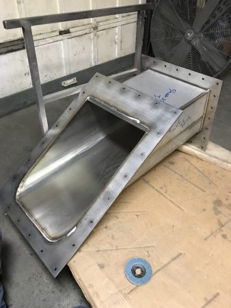 TRANSITION PIECES FOR MATERIAL FLOW