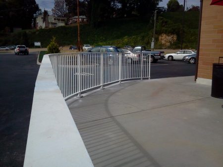FABRICATION AND INSTALLATION OF STEEL HANDRAIL WITH RADIUS PAINTED BLACK