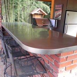 OUTDOOR KITCHEN WITH STAINLESS COUNTERTOPS
