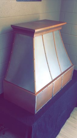 STAINLESS AND COPPER KITCHEN HOOD WITH RIVOTS