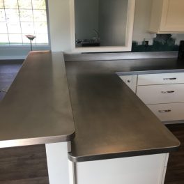 STAINLESS STEEL COUNTERTOP INSTALLATION WITH WELDED SINK