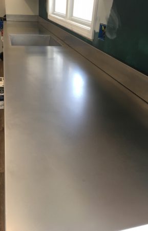 STAINLESS STEEL COUNTERTOP INSTALLATION WITH WELDED SINK